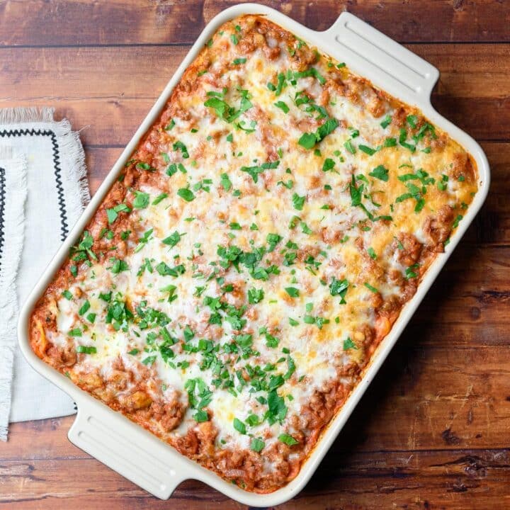 pasta dish with parsley on top